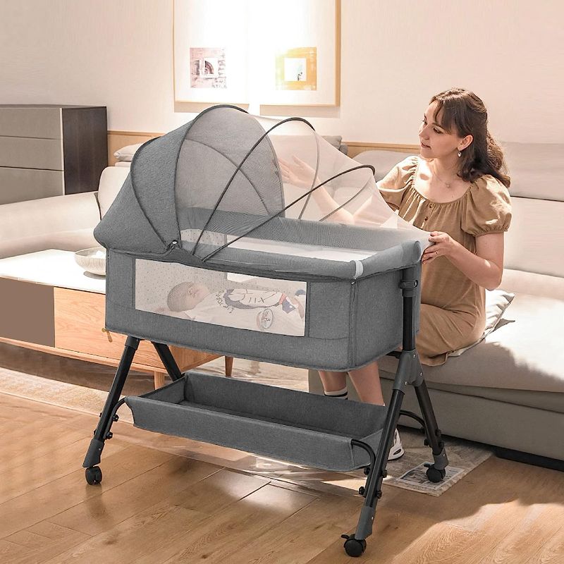 Photo 1 of Baby Bassinet Bedside Sleeper Cradle Bedside Crib Grey Baby Bed Portable Bassinet for Newborn Infant Baby with Storage Basket Lockable Wheels Adjustable...