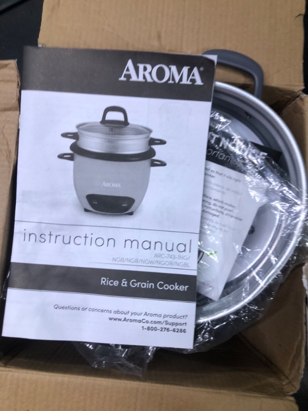 Photo 1 of Aroma Housewares 6-Cup (Cooked) Pot-Style Rice Cooker and Food Steamer, Black ARC-743-1NGB