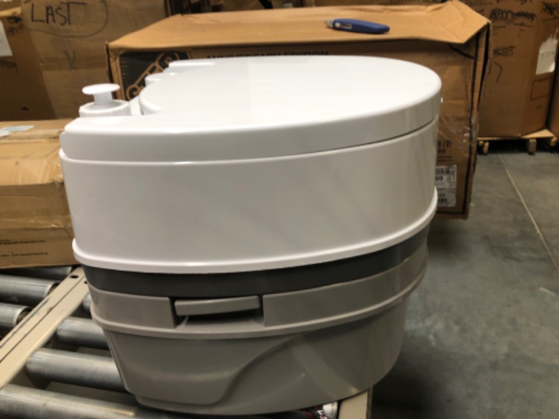 Photo 1 of Camco 41544 Premium Travel Toilet with Detachable Tank | Features a 5.3-Gallon Capacity | Designed for Camping, Hiking, Boating, RVing and More Frustration Free Packaging