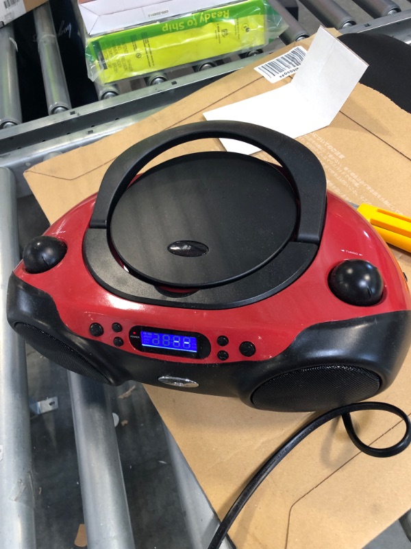 Photo 3 of GPX, Inc. Portable Top-Loading CD Boombox with AM/FM Radio and 3.5mm Line In for MP3 Device - Red/Black Red/black Single