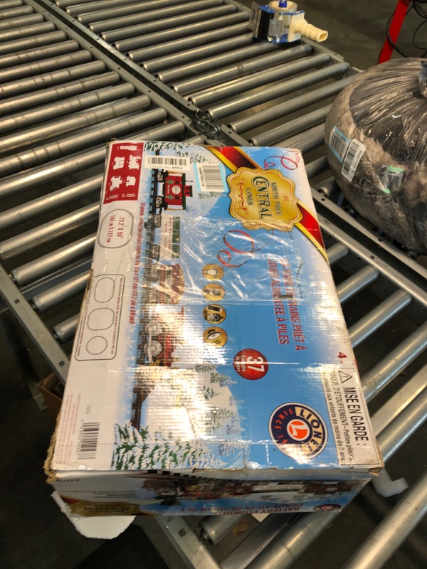 Photo 1 of Lionel North Pole Central Battery-Powered Train Set with Remote + Inner Loop Track Expansion Pack Complete Set + Expansion Track (Inner Loop)
