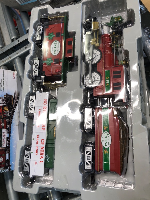 Photo 1 of Lionel North Pole Central Battery-Powered Train Set with Remote + Inner Loop Track Expansion Pack Complete Set + Expansion Track (Inner Loop)