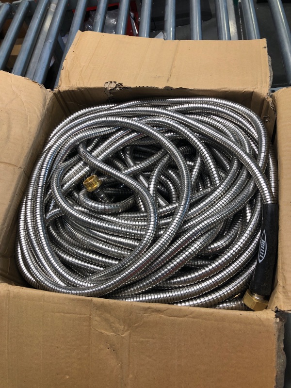 Photo 3 of ***MISSING SPRAY NOZZLE*** TITAN 200FT Metal Garden Hose - Flexible Water Hose with Solid 3/4" Brass Connectors 360 Degree Brass Jet Sprayer Nozzle - Lightweight Kink Free Strong and Durable Heavy Duty 304 Stainless Steel