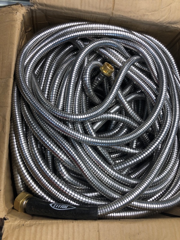 Photo 4 of ***MISSING SPRAY NOZZLE*** TITAN 200FT Metal Garden Hose - Flexible Water Hose with Solid 3/4" Brass Connectors 360 Degree Brass Jet Sprayer Nozzle - Lightweight Kink Free Strong and Durable Heavy Duty 304 Stainless Steel