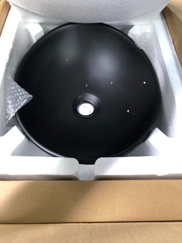 Photo 3 of Black Oval Bathroom Sink with Faucet and Drain Combo - VASOYO 16"x13" Matte Black Bathroom Vessel Sink Above Counter Oval Porcelain Ceramic Bathroom Vessel Vanity Sink, Faucet and Drain Combo 16"x13"-Oval Matte Black