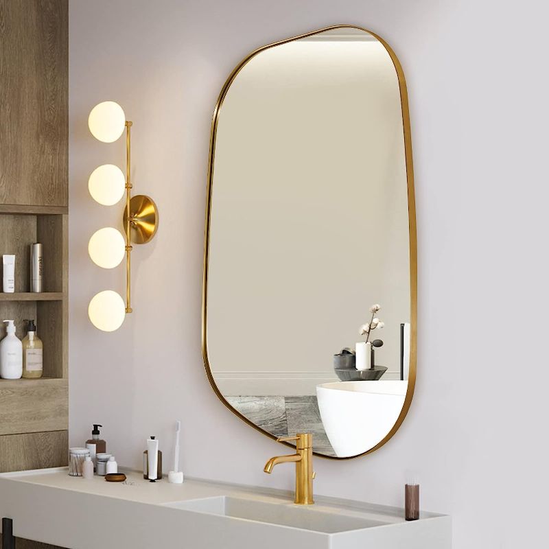 Photo 1 of ANDY STAR Irregular Mirror Asymmetrical Mirror for Wall 24x36” Brushed Gold Bathroom Mirror, Modern Wall Mirror for Living Room Bathroom Vanity Framed Mirror Artistic Mirror 1” Deep Set Design
