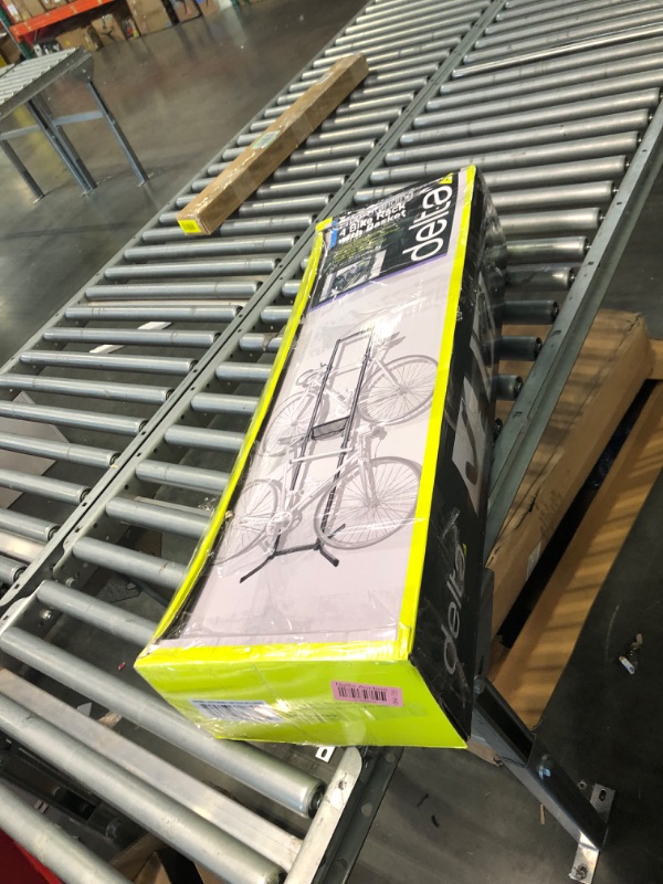 Photo 1 of Bike Rack for Garage & Home by Delta Cycle - No Drilling Required - Fully Adjustable Gravity Storage Rack for Any Style Bicycle - Freestanding Vertical Rack 4 Bike Rack with Shelf