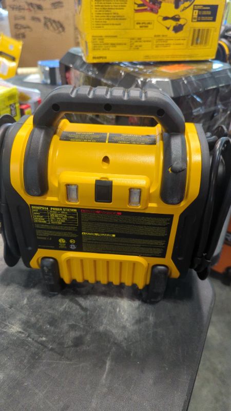 Photo 4 of DEWALT DXAEPS14 1600 Peak Battery Amp 12V Automotive Jump Starter/Power Station with 500 Watt AC Power Inverter, 120 PSI Digital Compressor, and USB Power , Yellow