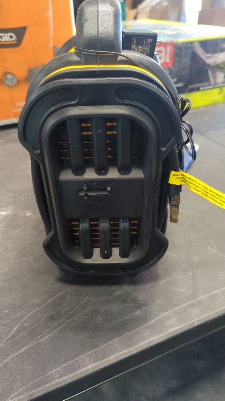 Photo 1 of DEWALT DXAEPS14 1600 Peak Battery Amp 12V Automotive Jump Starter/Power Station with 500 Watt AC Power Inverter, 120 PSI Digital Compressor, and USB Power , Yellow