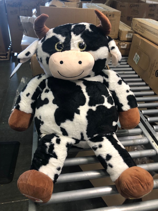 Photo 1 of EARTHSOUND Giant Cow Stuffed Animal Plush Toy,Large Cow Jumbo Cute Soft Toys,Big Size Huge Fluffy Plushy Oversized Fat Plushie,Gifts for Kids Girls Boys Girlfriend (30 inches, Black and White) 30 inches Black and White