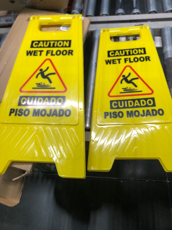 Photo 3 of CERLMLAND Caution Wet Floor Sign, Foldable Sturdy Bilingual Double-Sided Safety Warning Signs for Commercial Use, Pool (2-Pack Yellow) Yellow 2-Pack