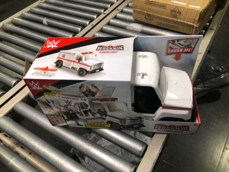 Photo 2 of WWE Slambulance Wrekkin' Vehicle Breakaway Ambulance, for 6-Inch Action Figure [Amazon Exclusive] for Boys