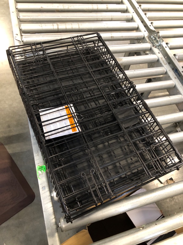 Photo 1 of Amazon Basics Foldable Metal Wire Dog Crate with Tray, Single Door, 22 Inch 22" Single Door w/ Divider Crate