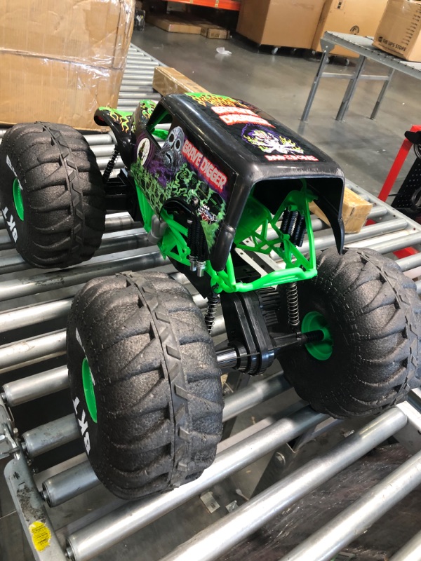 Photo 5 of Losi RC Truck LMT 4 Wheel Drive Solid Axle Monster Truck RTR Battery and Charger Not Included Grave Digger LOS04021T1 Green