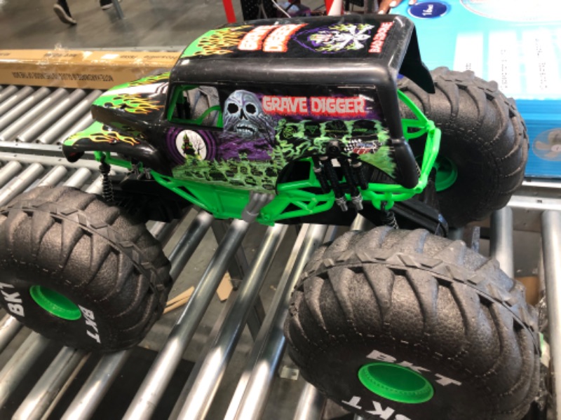 Photo 4 of Losi RC Truck LMT 4 Wheel Drive Solid Axle Monster Truck RTR Battery and Charger Not Included Grave Digger LOS04021T1 Green