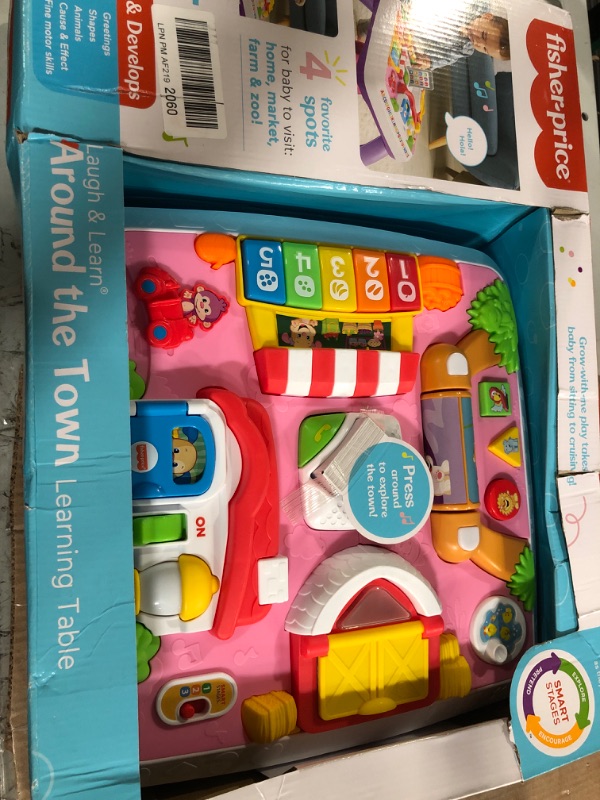 Photo 2 of Fisher-Price Laugh & Learn Around The Town Learning Table, Pink Interactive Play Center with Smart Stages Learning Content for Infants and Toddlers Ages 6 Months & up