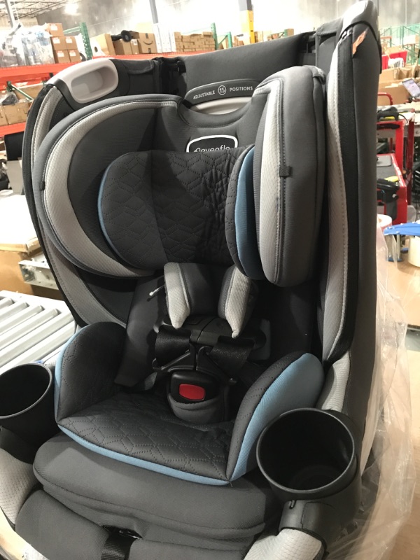 Photo 2 of Evenflo Revolve360 Slim 2-in-1 Rotational Car Seat with Quick Clean Cover (Stow Blue) Revolve Slim Quick Clean Cover Stow Blue