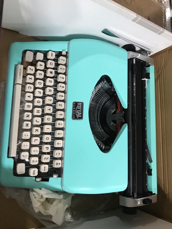 Photo 2 of Royal 79101T Classic Manual Typewriter (Mint Green)