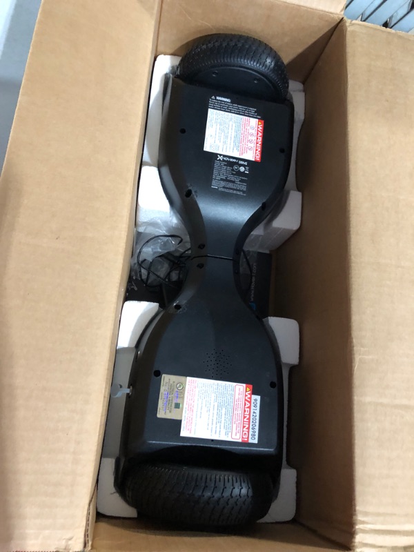 Photo 4 of **FOR PARTS OR REPAIR**
Hover-1 Drive Electric Hoverboard | 7MPH Top Speed, 3 Mile Range, Long Lasting Lithium-Ion Battery, 6HR Full-Charge, Path Illuminating LED Lights Black