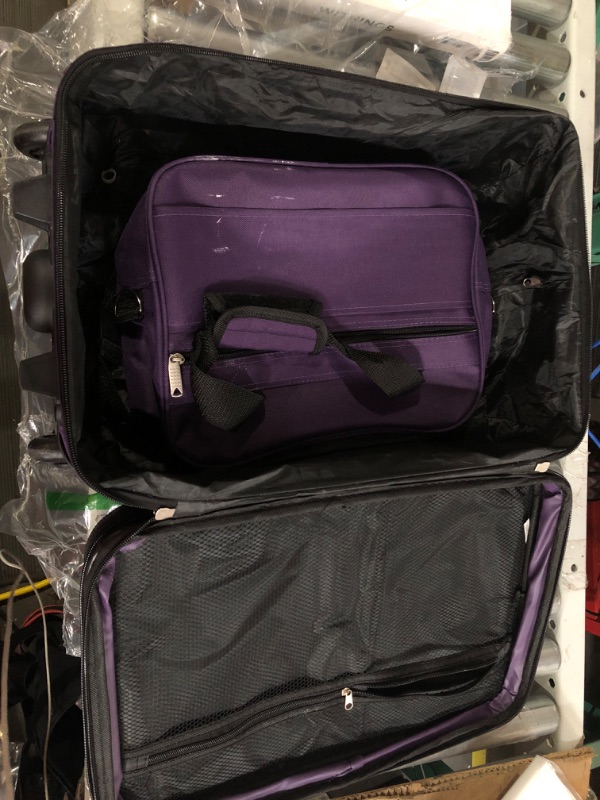 Photo 3 of USED Rockland Fashion Softside Upright Luggage Set, Purple, 2-Piece (14/19) 2-Piece Set (14/19) Purple Standard Packaging