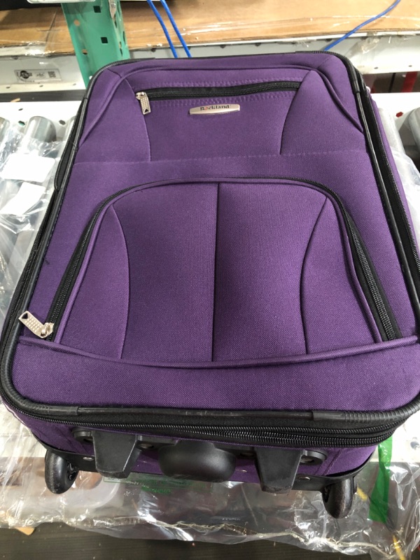 Photo 2 of USED Rockland Fashion Softside Upright Luggage Set, Purple, 2-Piece (14/19) 2-Piece Set (14/19) Purple Standard Packaging