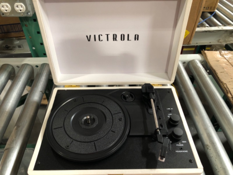 Photo 4 of **MISSING POWER CORD**
Victrola Vintage 3-Speed Bluetooth Portable Suitcase Record Player 