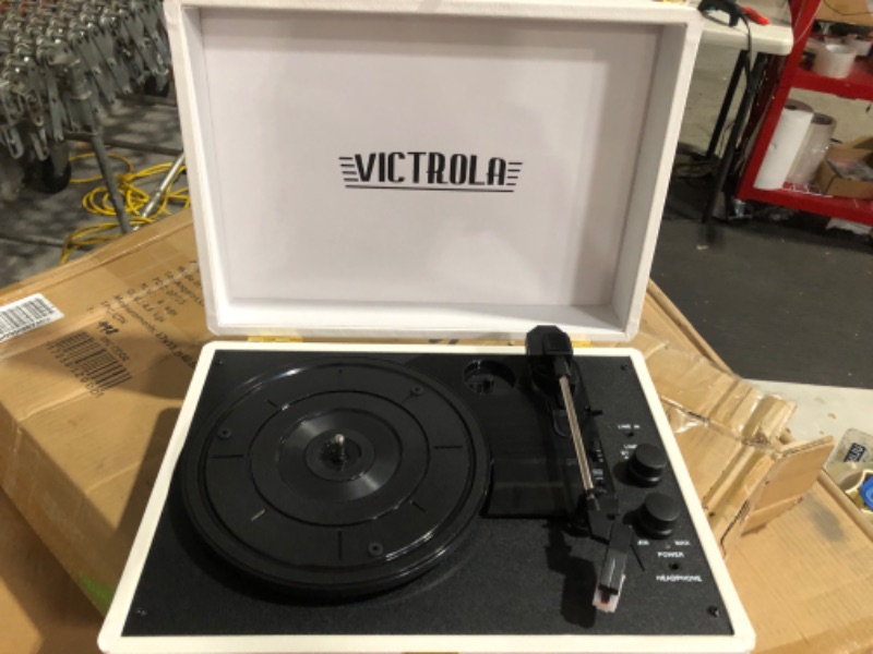 Photo 2 of **SEE NOTES**
Victrola Vintage 3-Speed Bluetooth Portable Suitcase Record Player with Built-in Speakers | Upgraded Turntable Audio Sound| White (VSC-550BT-WH)
