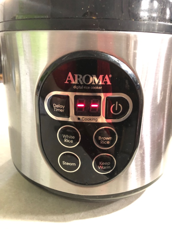 Photo 2 of **SEE NOTES**
Aroma Housewares ARC-914SBD Digital Cool-Touch Rice Grain Cooker and Food Steamer, Stainless, Silver, 4-Cup (Uncooked) / 8-Cup (Cooked) Basic