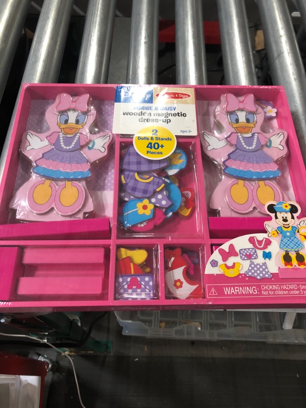 Photo 1 of Melissa & Doug Disney Minnie Mouse and Daisy Duck Magnetic Dress-Up Wooden Doll Pretend Play Set (40+ pcs) & Disney Minnie Mouse Mix and Match 