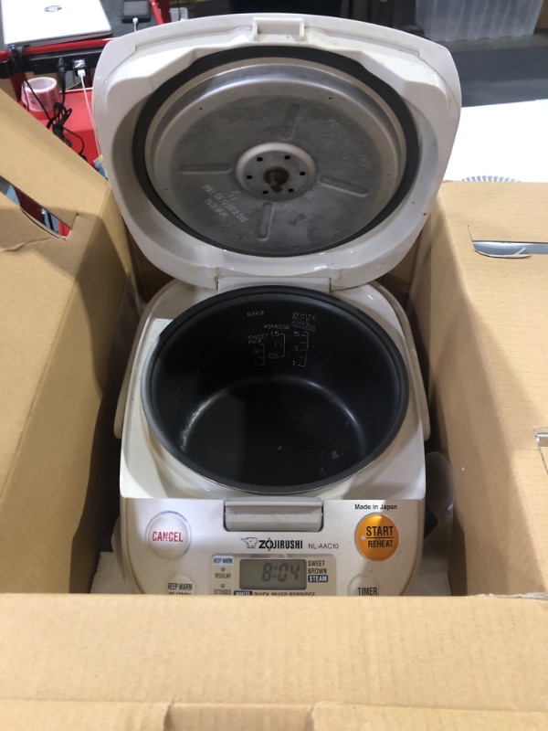 Photo 2 of * USED * 
Zojirushi, Made in Japan Neuro Fuzzy Rice Cooker, 5.5-Cup, Premium White