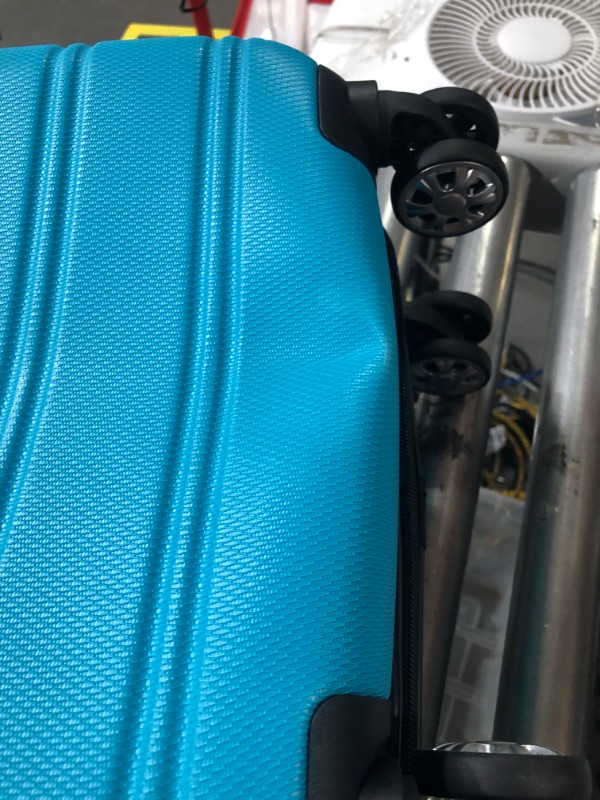 Photo 3 of * DAMAGED * 
Rockland Melbourne Hardside Expandable Spinner Wheel Luggage, Turquoise, Carry-On 20-Inch