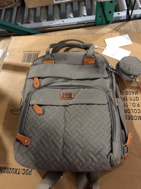 Photo 1 of BabbleRoo Diaper Bag Backpack, Waterproof Travel Back Pack with Changing Pad & Stroller Straps & Pacifier Case, (Khaki)