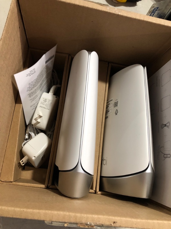 Photo 5 of NETGEAR Orbi Quad-Band WiFi 6E Mesh System (RBKE963), Router with 2 Satellite Extenders, Coverage up to 9,000 sq. ft, 200 Devices, 10 Gig Internet Port, AXE11000 802.11 Axe (Up to 10.8Gbps) WiFi 6E | 3-Pack