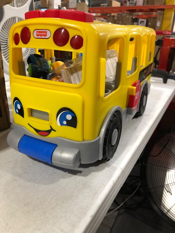 Photo 2 of Fisher-Price Little People Toddler School Bus Push Toy with Lights Sounds and Smart Stages Learning Content, 4 Toy Figures? Big Yellow School Bus