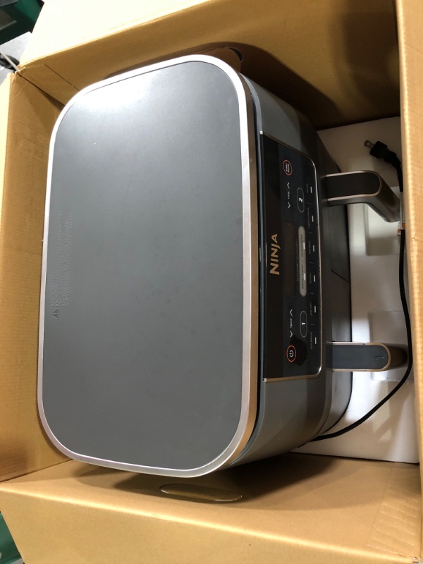 Photo 3 of **item has been used**has food stains and crumbs**instructions are missing**
Ninja DZ201 Foodi 8 Quart 6-in-1 DualZone 2-Basket Air Fryer **NOT TESTED**