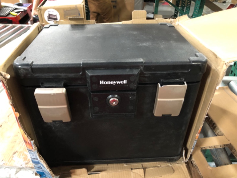 Photo 2 of **USED** Honeywell Safes & Door Locks 30 Minute Fire Safe Waterproof Filing Safe Box Chest (fits Letter and A4 Files), Medium, 1106 Cartoon