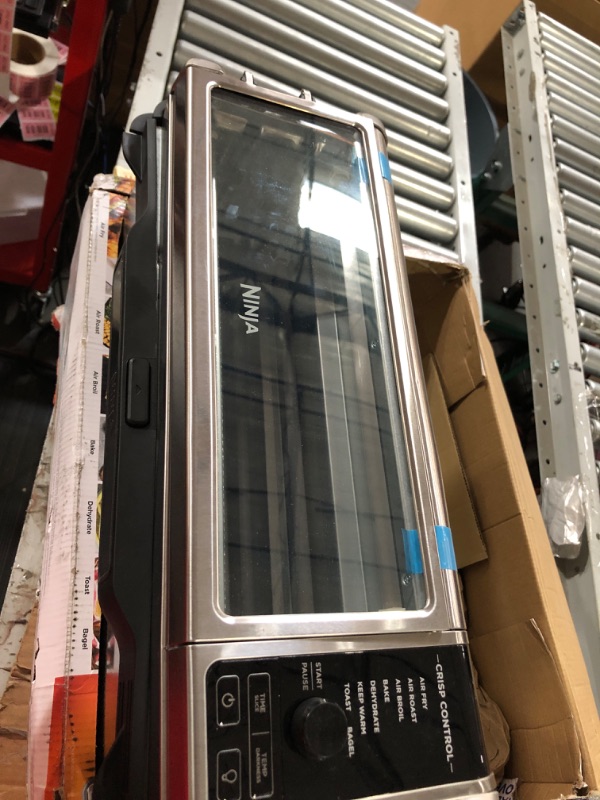 Photo 1 of **item is used and damaged**door does not fully close**sold for parts**
Ninja Foodi 8-in-1 Digital Air Fry Oven