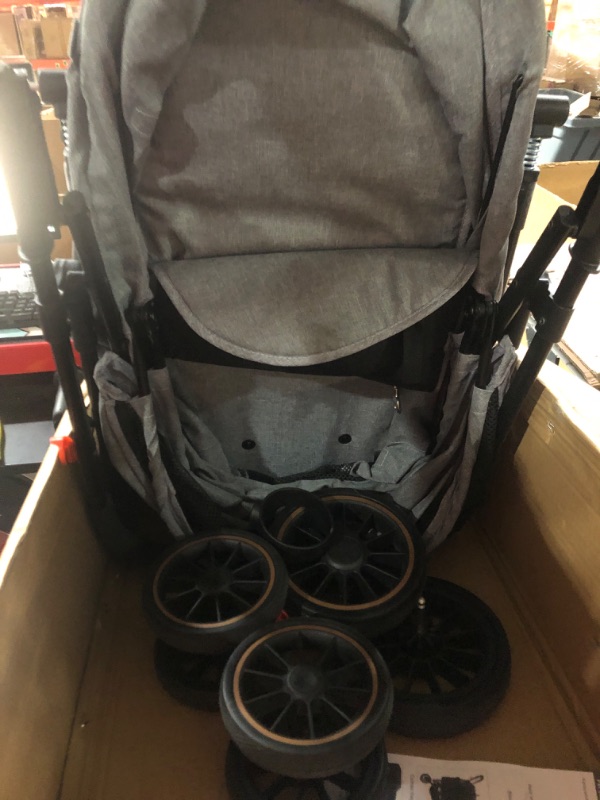 Photo 3 of Dog Strollers for Small Medium Dogs - Pet Stroller Rubber 4 Wheels with Shock Absorbers,Easy one-Handed Folding,Removable Basket for Travel Carrier,No Zipper Entry