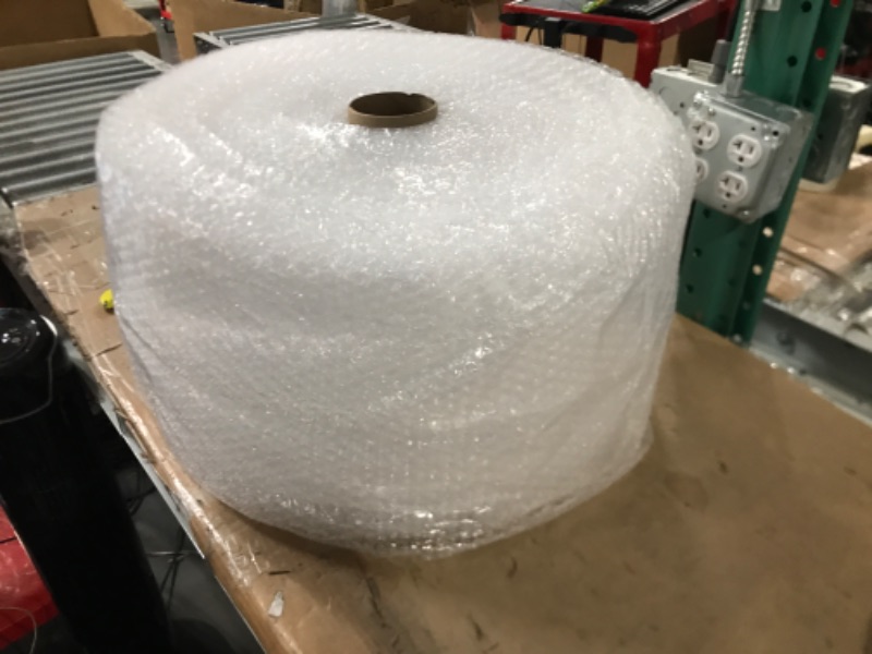 Photo 2 of Amazon Basics Perforated Bubble Cushioning Wrap - Small 3/16", 12-Inch x 175-Foot Long Roll