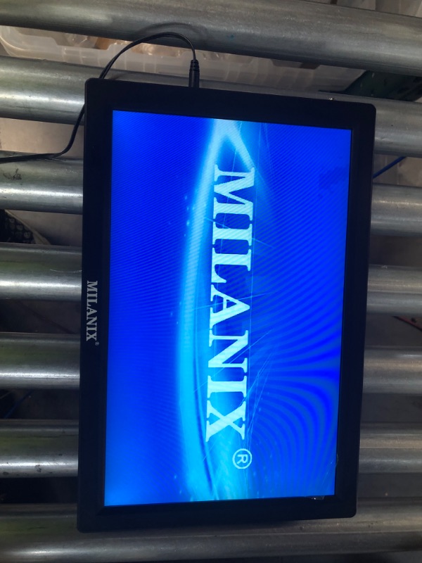 Photo 3 of Milanix 14.1" Portable Widescreen LED TV with HDMI VGA MMC FM Usb/sd Card Slot Built in Digital Tuner AV Inputs and Remote Control