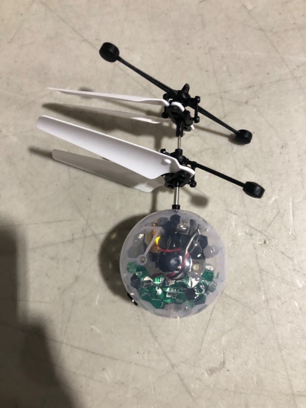 Photo 2 of Flying Toy Ball Infrared Induction RC Flying Toy Built-in LED Light Disco Helicopter Shining Colorful Flying Drone Indoor and Outdoor Games Toys for 3 4 5 6 7 8 9 10 Year Old Boys and Girls