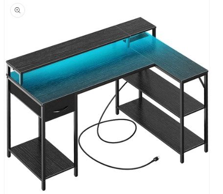 Photo 1 of SUPERJARE L Shaped Computer Desk with Power Outlets & LED Strips, Black, 7935BC