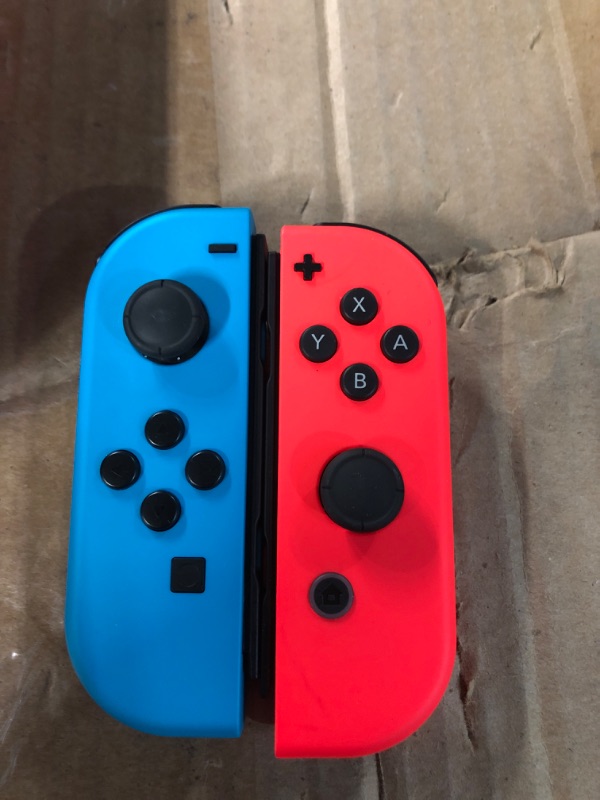 Photo 2 of Nintendo Switch™ with Neon Blue and Neon Red Joy?Con™ Console Neon