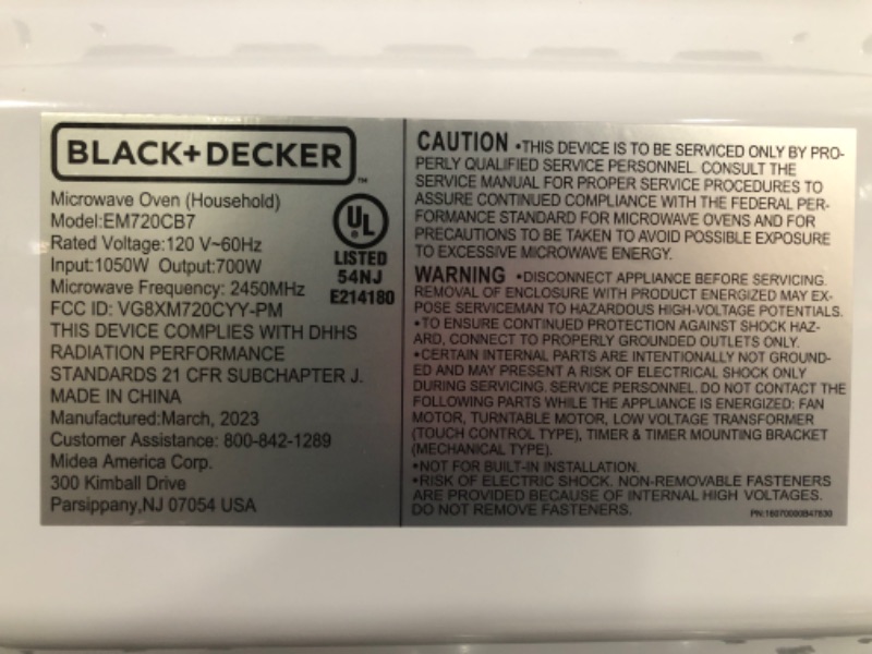 Photo 2 of **the plate in the microwave is incompatible***
black+decker em720cb7 digital microwave oven 