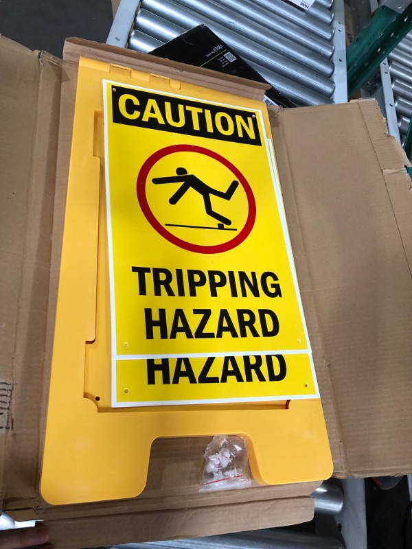 Photo 2 of "Caution - Tripping Hazard" Folding Floor Sign 25" x 12" Plastic 