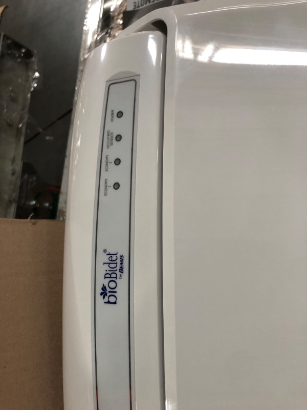 Photo 3 of **REMOTE DOESN'T WORK**
Bio Bidet by Bemis BB-1000W Supreme Warm Water Bidet Toilet Seat, Elongated, White BB-1000 Wireless Remote Elongated