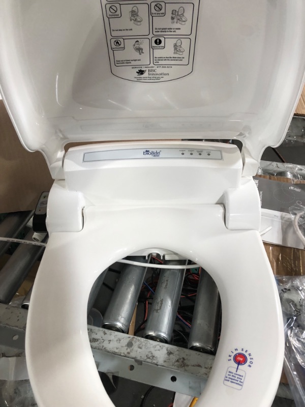 Photo 4 of **REMOTE DOESN'T WORK**
Bio Bidet by Bemis BB-1000W Supreme Warm Water Bidet Toilet Seat, Elongated, White BB-1000 Wireless Remote Elongated