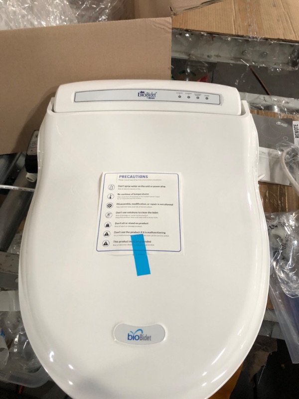 Photo 2 of **REMOTE DOESN'T WORK**
Bio Bidet by Bemis BB-1000W Supreme Warm Water Bidet Toilet Seat, Elongated, White BB-1000 Wireless Remote Elongated