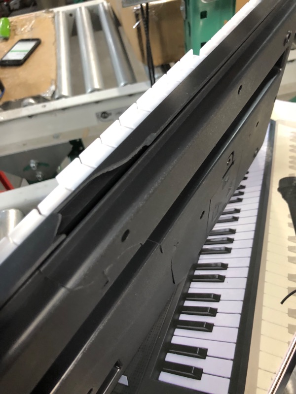Photo 1 of *DAMAGED*UIOTYO 61 keys piano keyboard,Black