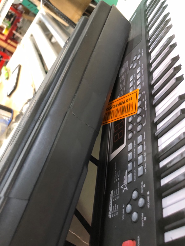 Photo 1 of *DAMAGED*UIOTYO 61 keys piano keyboard,Black